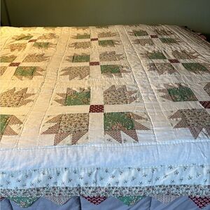 This quilt is a Bear Paw pattern popular during the pioneer & slavery eras.
